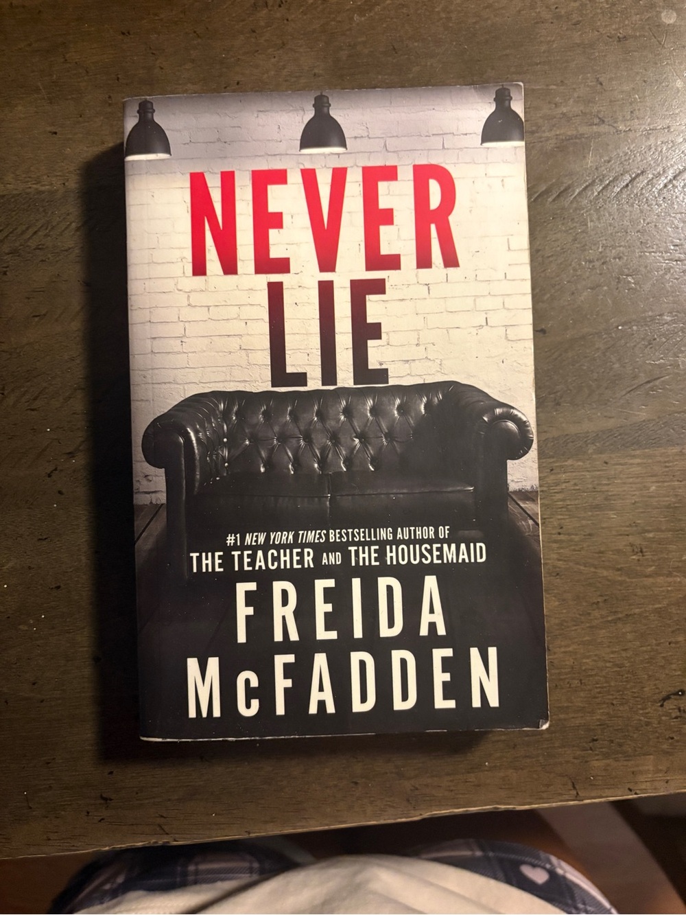 Never Lie by Freida McFadden - Black & White Cover